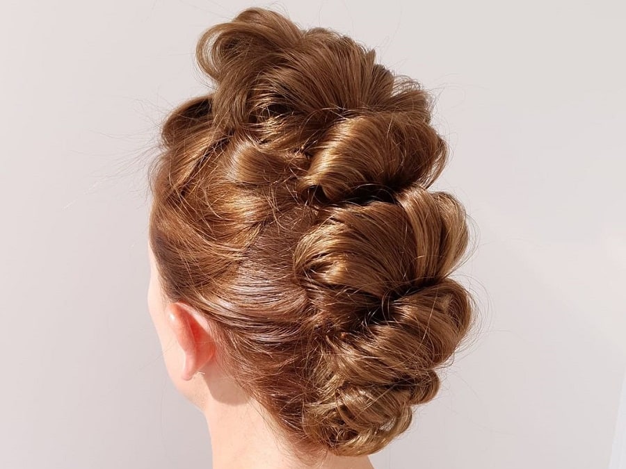 updo with thick mohawk pull through braids