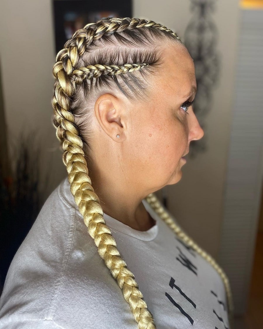 older woman with blonde boxer braids