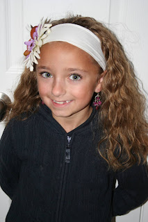 Portrait of Young girl' modeling 2nd Day Curls from Double-French Braids