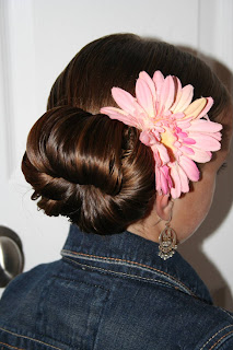 Side view of young girl modeling "Teen Hair Bun" hairstyle