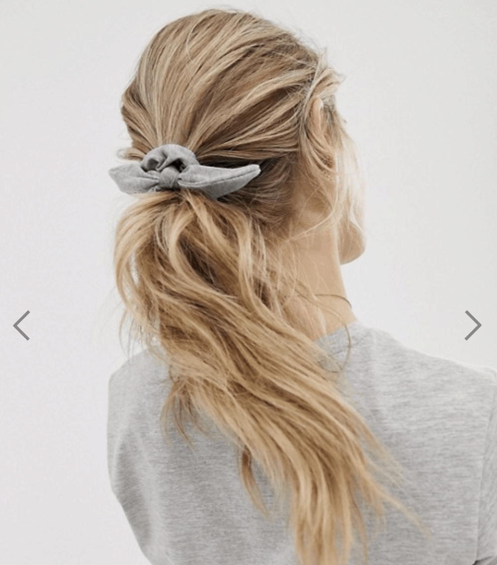 model wearing bow hair scrunchie