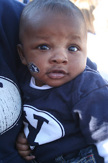 Infant baby boy in a BYU shirt