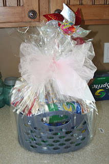 Gift basket with snacks decorated with ribbon