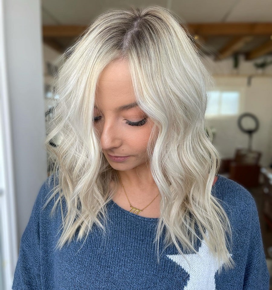 white blonde hair with dark roots