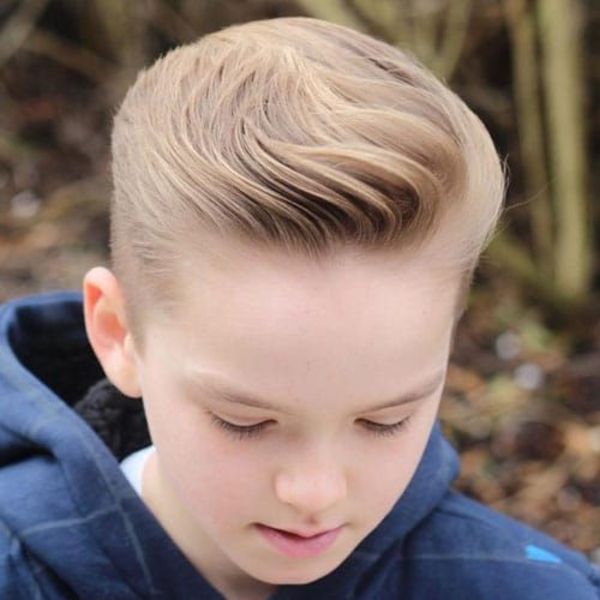 wavy brushed back undercut hairstyle