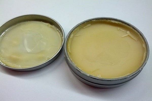 fresh homemade mustache wax in container