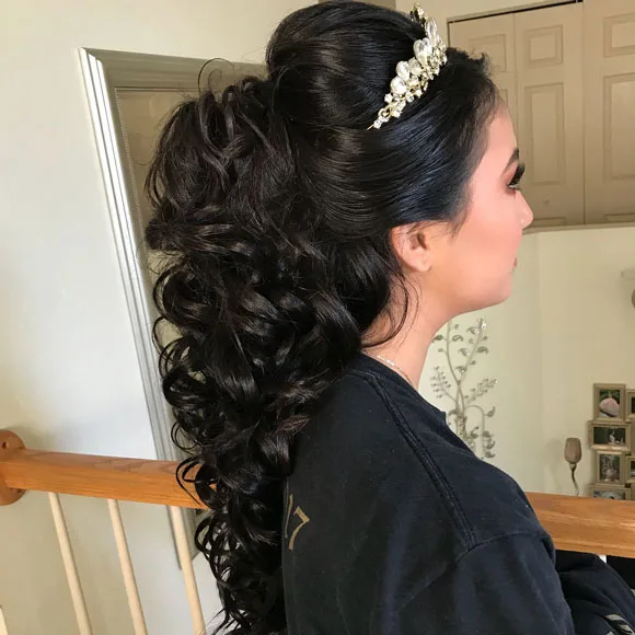 The half up half down hairstyle for quinceanera damas