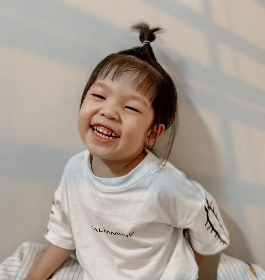 Asian boy with long hairstyle