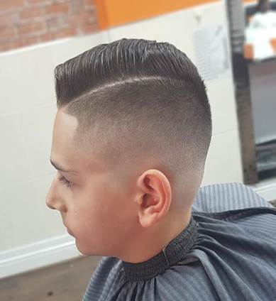 Comb Over Hairstyle And Hard Parted Skin Fade