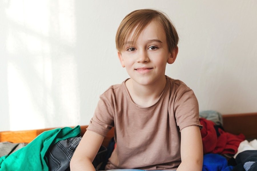 little boy with summer haircut for thin hair