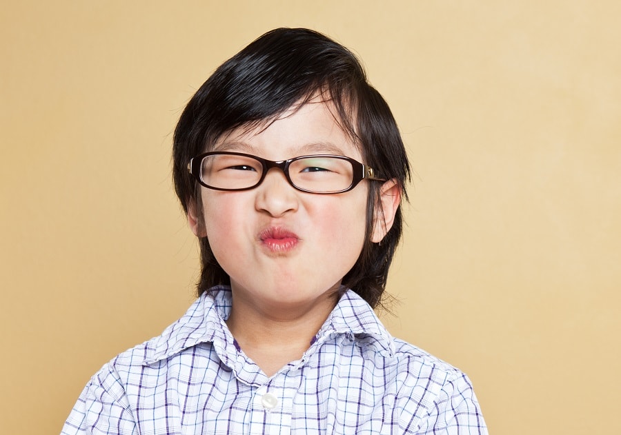 Asian boy with long hair