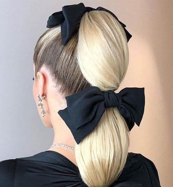 Sleek Ponytail With Butterfly Ribbons