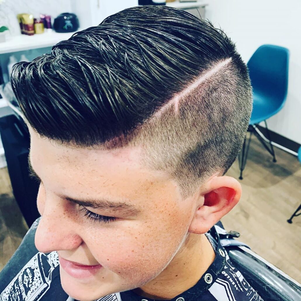 Side Swept Hairstyle With High Fade