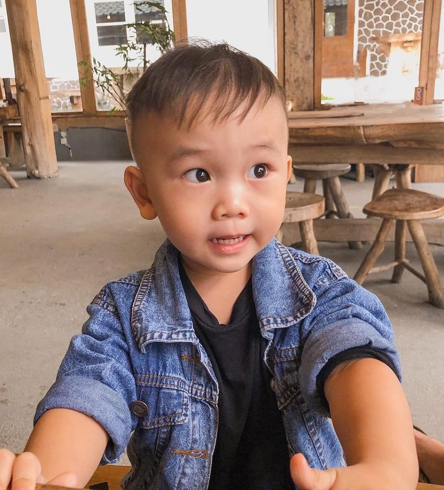 Asian boy with thin hair