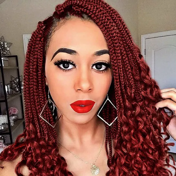 Red box braids with curly ends