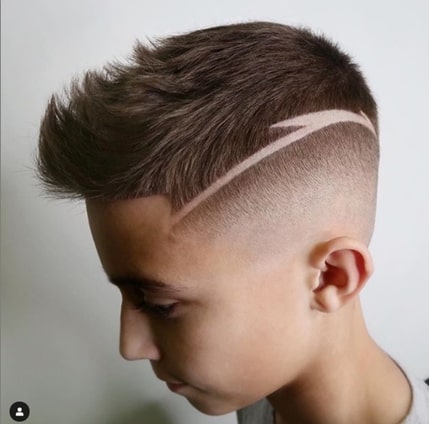 Forward Swept Spiky Hairstyle With Side Fade And Stylish Part