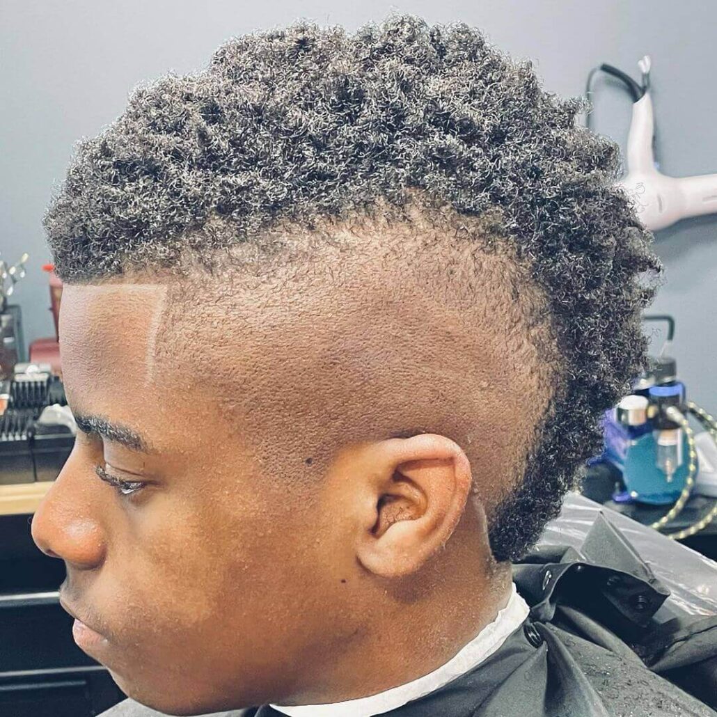 Kinky Mohawk With Bald Fade