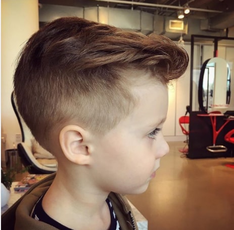 Medium Length Side Swept Hair With High Fade