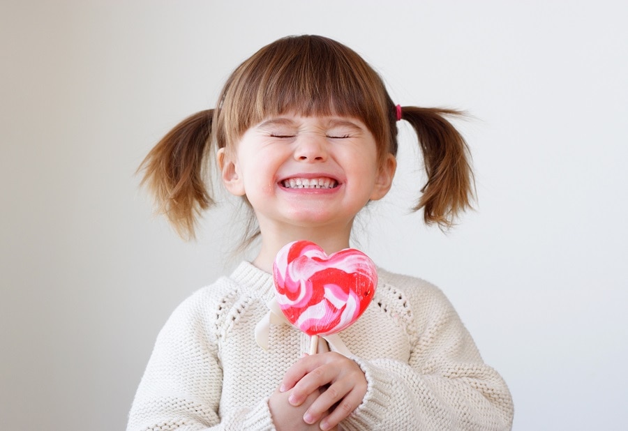 little girl with pigtails