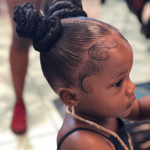 Slicked Back Hairstyle With Braided Pigtails