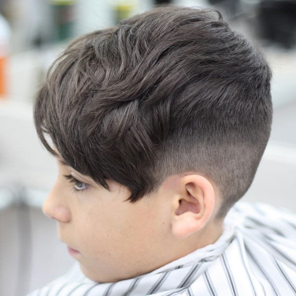 Messy Forward Swept Hairstyle With Taper Fade