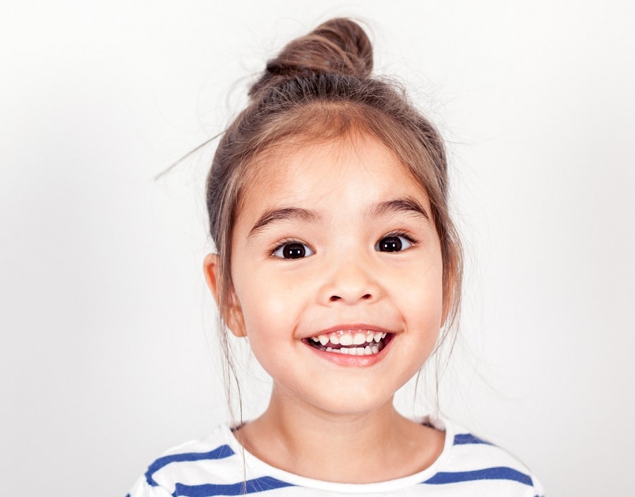 high bun hairstyle for little girl