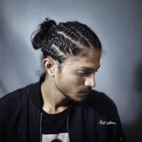 Man Bun Braids: A Surprising New Men's Hair Trend