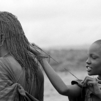 Everything You Need To Know About Micro Locs: From Styling to Caring