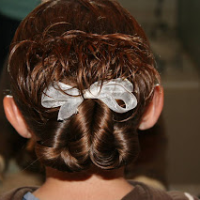 Updo Hairstyle: Pretzel-Twist Messy Bun